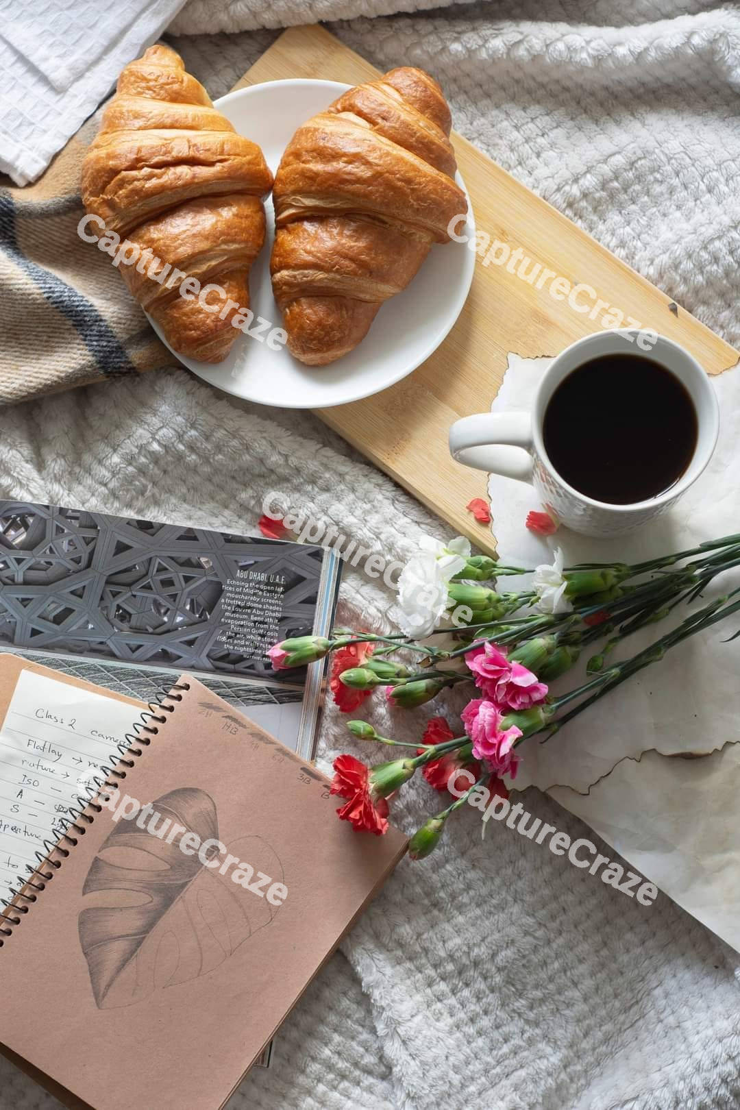 Cup of coffee with croissants